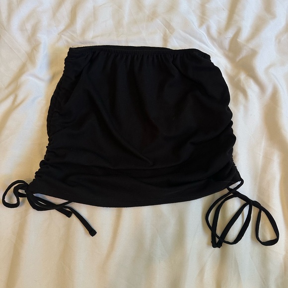 Dresses & Skirts - Black mini skirt with singed sides